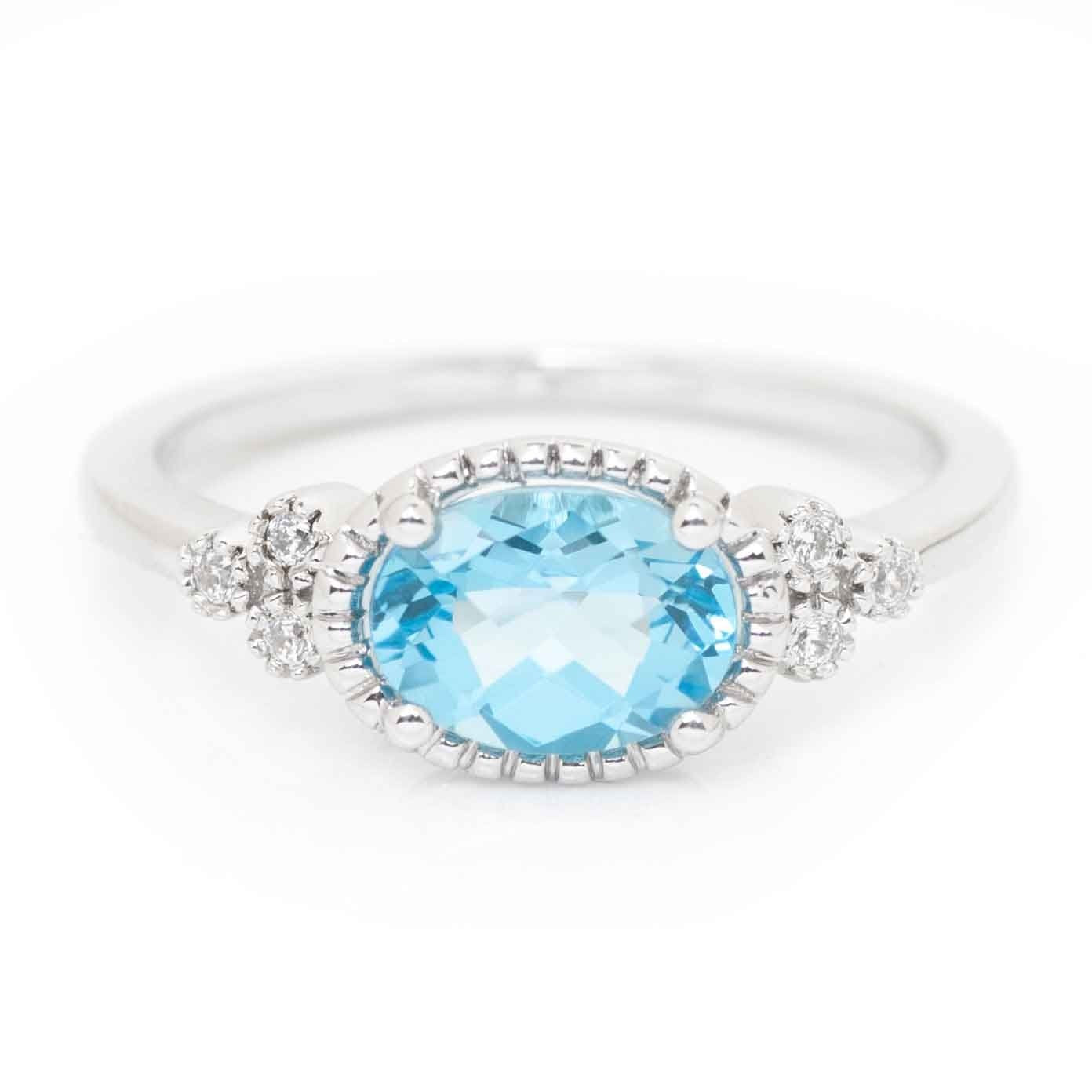 AGI Blue Topaz and Diamond Ring